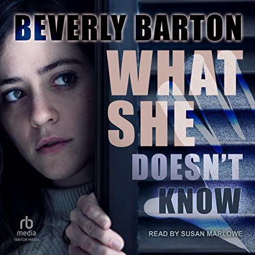 Cover of What She Doesn't Know